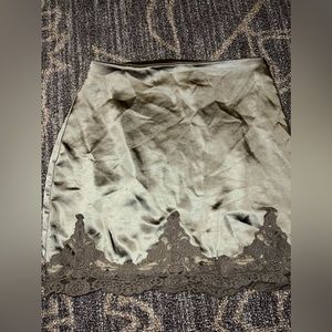 Urban Outfitters green satin skirt with lace mini skirt